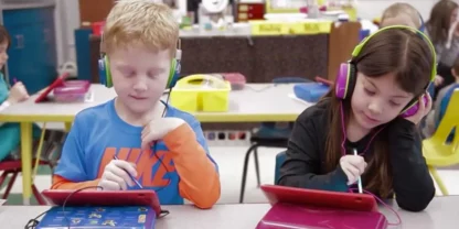 Two students using eSpark on tablets